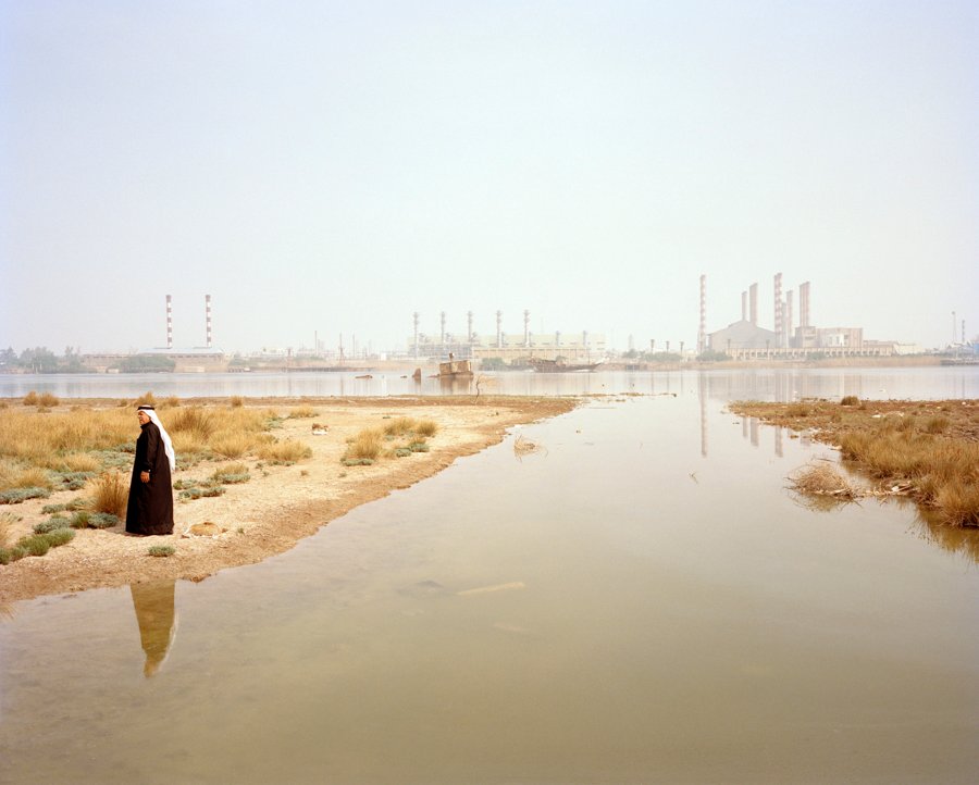 The small city of Siba located near the Iranian border, has emptied because of the drought. It's estimated that one third of the population has already left Siba and another third might soon join them leaving for exile. A man is walking along the polluted water of the Shatt al-Arab in Siba. On the other is side of the river is Iran. Iraq